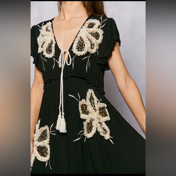 Ruffle Trim V-Neck Embroidery Sequins
Tassel Long Dress - Picture 5 of 6